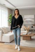 Pull noir – mannequin 40/42 – salon moderne