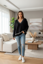 Pull noir – mannequin 40/42 – salon moderne